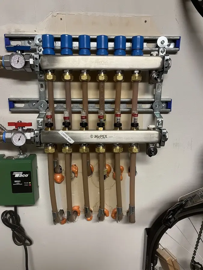 Plumber performing Gas Line Installation at a residential property in Sage